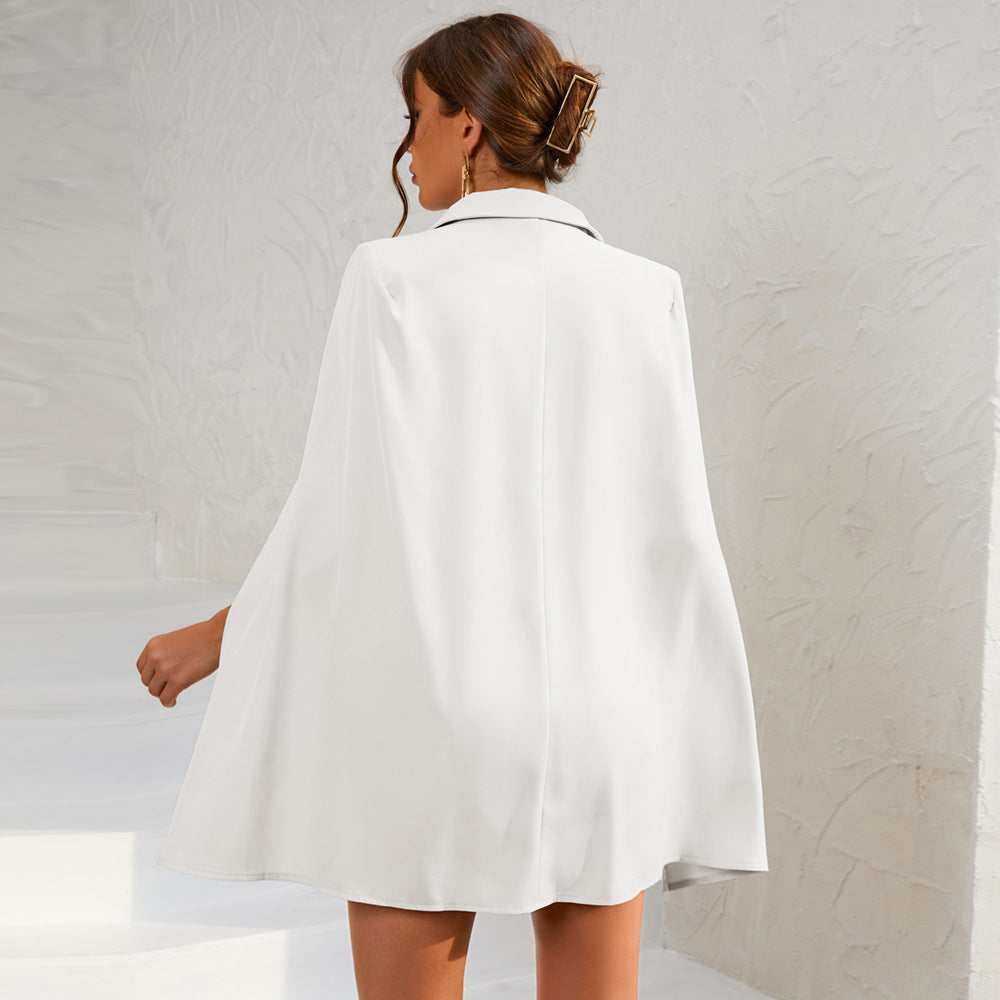 https://cdn.shopify.com/s/files/1/0957/7286/8982/files/Cape-Blazer-Mini-Dress-with-Belt-and-Gold-Button-Detail-10.jpg?v=1770236859