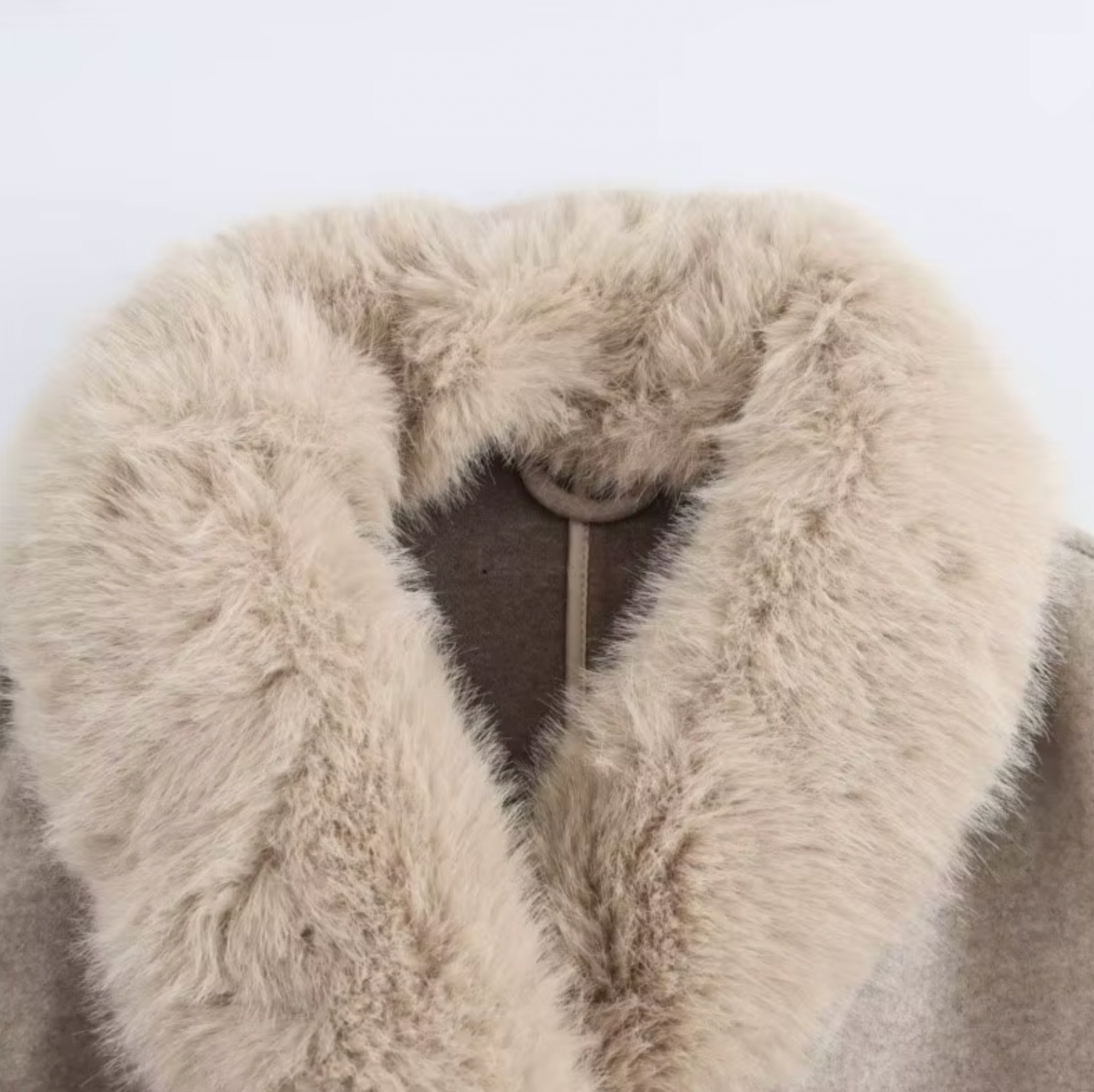 https://cdn.shopify.com/s/files/1/0957/7286/8982/files/Womens-Beige-Double-Breasted-Trench-Coat-with-Faux-Fur-Collar-Belted-Longline-Design-4.png?v=1770237651
