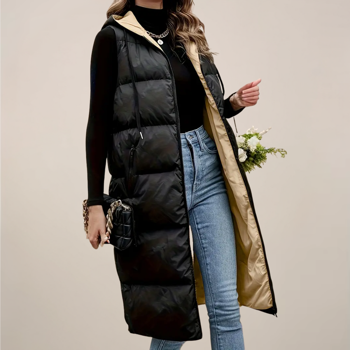 https://cdn.shopify.com/s/files/1/0957/7286/8982/files/Womens-Black-Longline-Puffer-Gilet-Hooded-Zip-Front-Zipped-Pockets.png?v=1770237648