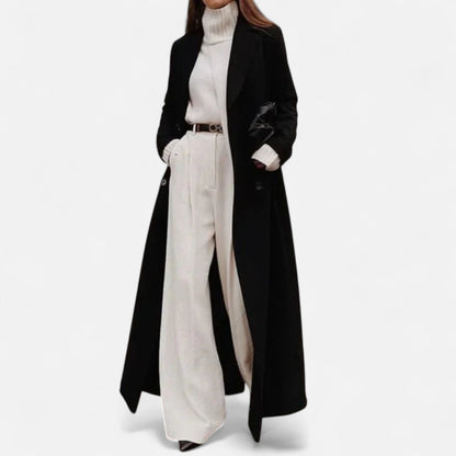 https://cdn.shopify.com/s/files/1/0957/7286/8982/files/Womens-Black-Maxi-Overcoat-Longline-Tailored-Outerwear-for-All-Season-Elegance-2.jpg?v=1770237642