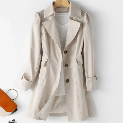 https://cdn.shopify.com/s/files/1/0957/7286/8982/files/Womens-Casual-Trench-Coat-Timeless-Everyday-Layer-3.webp?v=1770237648