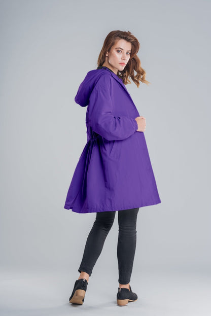 https://cdn.shopify.com/s/files/1/0957/7286/8982/files/Womens-Lightweight-Hooded-Coat-Casual-Longline-Button-Up-Jacket-18_9e2579b2-3f4f-4a8a-b9e6-b7ee37ecf8a7.jpg?v=1770237650