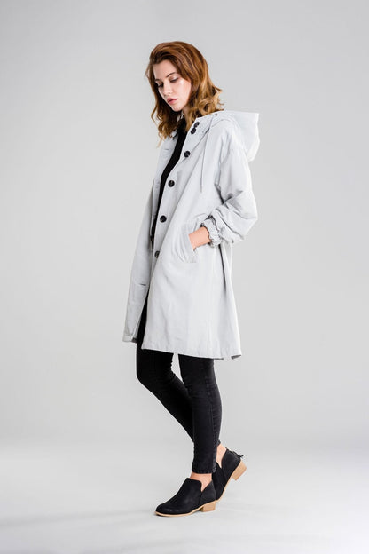 https://cdn.shopify.com/s/files/1/0957/7286/8982/files/Womens-Lightweight-Hooded-Coat-Casual-Longline-Button-Up-Jacket-3_d9404ac9-fe09-4047-80fa-8057c0135e13.jpg?v=1770237648