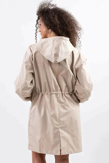 https://cdn.shopify.com/s/files/1/0957/7286/8982/files/Womens-Lightweight-Hooded-Coat-Casual-Longline-Button-Up-Jacket-6_a8d2ccfd-be6e-4386-b85e-ff3ea3352496.jpg?v=1770237649