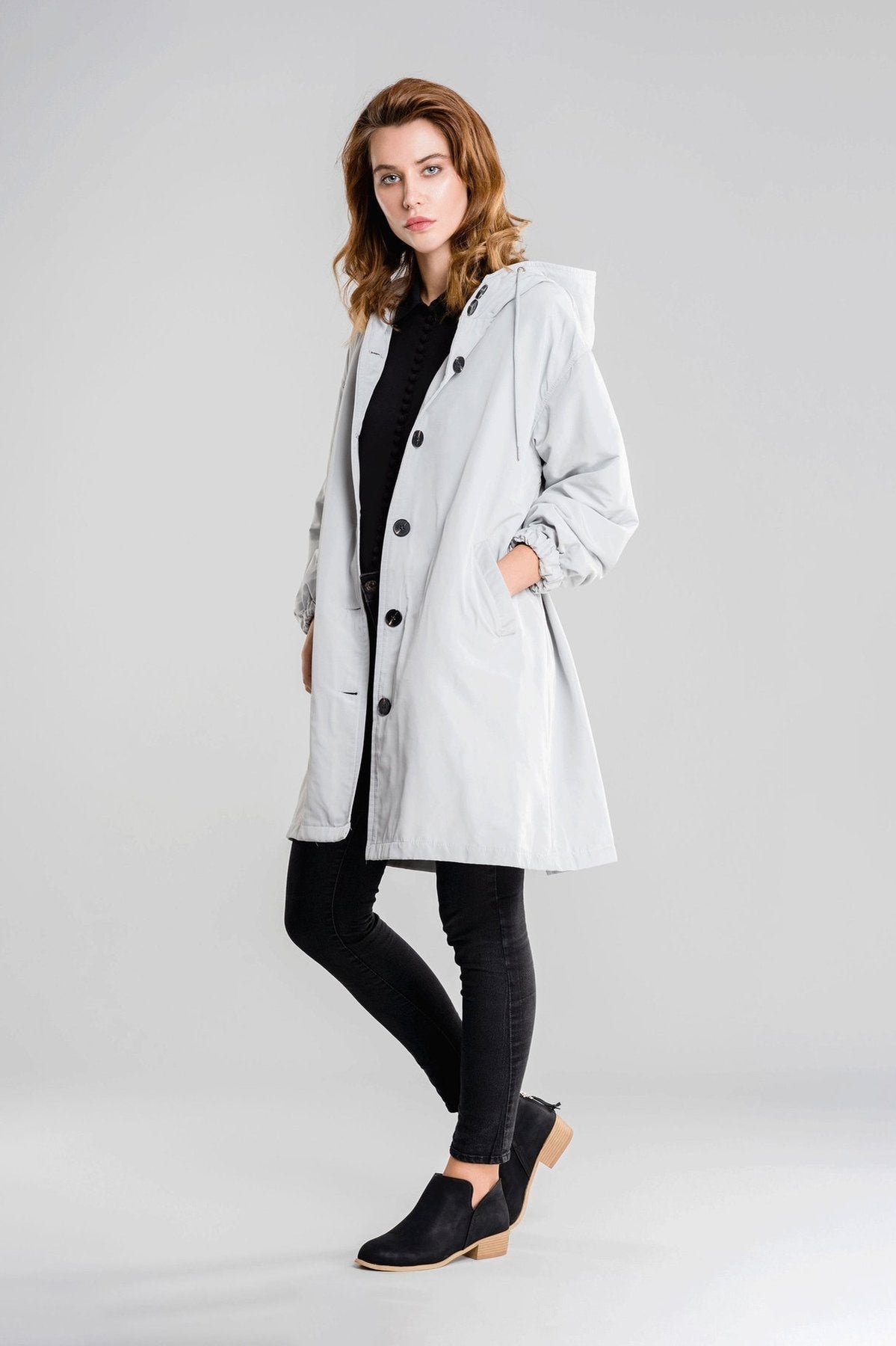 https://cdn.shopify.com/s/files/1/0957/7286/8982/files/Womens-Lightweight-Hooded-Coat-Casual-Longline-Button-Up-Jacket_fc5bbc1e-a061-42e0-a9ba-45efb5bd4e07.jpg?v=1770237649