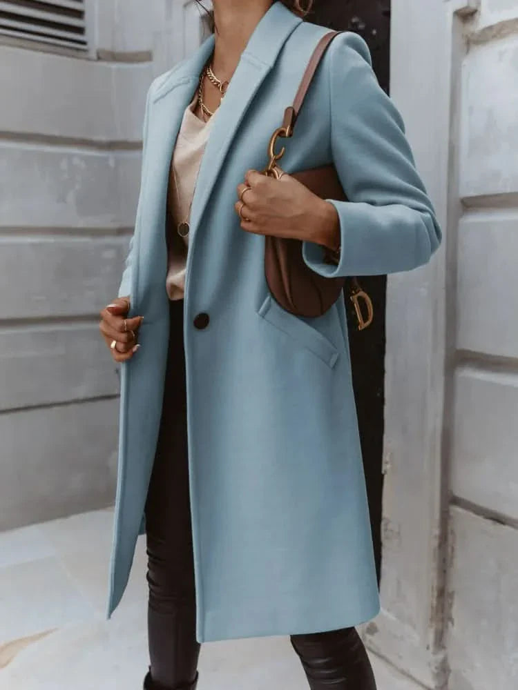 https://cdn.shopify.com/s/files/1/0957/7286/8982/files/Womens-Long-Tailored-Coat-Elegant-Structured-Overcoat-for-Smart-Layering-2.jpg?v=1770237647