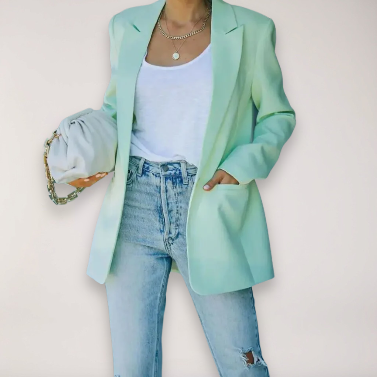 https://cdn.shopify.com/s/files/1/0957/7286/8982/files/Womens-Oversized-Blazer-Single-Breasted-Notched-Lapel-Jacket-for-Elegant-Layering-3.png?v=1770236864