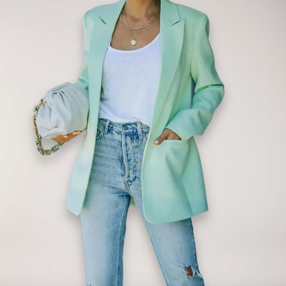 https://cdn.shopify.com/s/files/1/0957/7286/8982/files/Womens-Oversized-Blazer-Single-Breasted-Notched-Lapel-Jacket-for-Elegant-Layering-3.png?v=1770236864