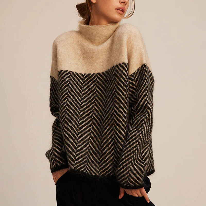 https://cdn.shopify.com/s/files/1/0957/7286/8982/files/Womens-Oversized-Turtleneck-Sweater-Soft-Two-Tone-Knit-with-Chevron-Pattern.png?v=1770237693
