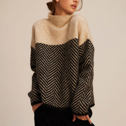 https://cdn.shopify.com/s/files/1/0957/7286/8982/files/Womens-Oversized-Turtleneck-Sweater-Soft-Two-Tone-Knit-with-Chevron-Pattern.png?v=1770237693