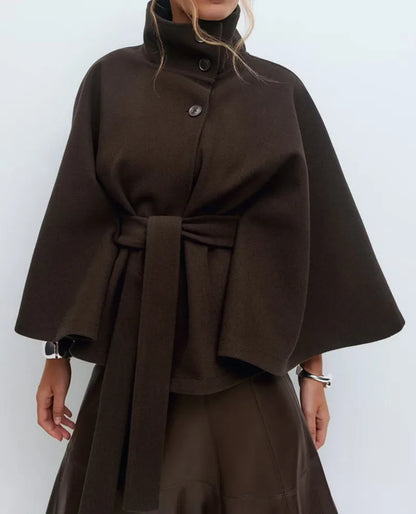 https://cdn.shopify.com/s/files/1/0957/7286/8982/files/Womens-Short-Cape-Coat-Funnel-Neck-Belted-Waist-Cape-Sleeves-5.webp?v=1770237641