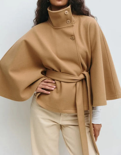 https://cdn.shopify.com/s/files/1/0957/7286/8982/files/Womens-Short-Cape-Coat-Funnel-Neck-Belted-Waist-Cape-Sleeves.webp?v=1770237641