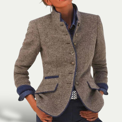 https://cdn.shopify.com/s/files/1/0957/7286/8982/files/Womens-Tailored-Short-Blazer-with-Stand-Collar-Smart-Casual-Layer.jpg?v=1770236859