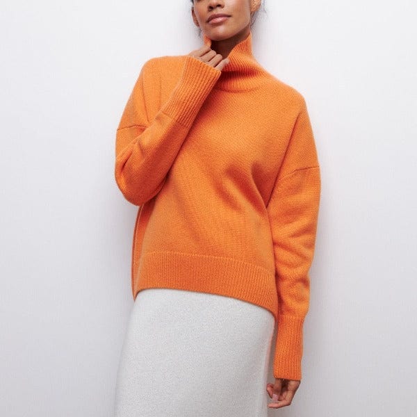 https://cdn.shopify.com/s/files/1/0957/7286/8982/files/Womens-Turtleneck-Sweater-Oversized-Elbow-Sleeve-Ribbed-Trims-4.jpg?v=1770237692