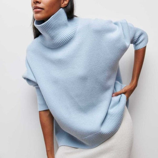 https://cdn.shopify.com/s/files/1/0957/7286/8982/files/Womens-Turtleneck-Sweater-Oversized-Elbow-Sleeve-Ribbed-Trims.jpg?v=1770237692