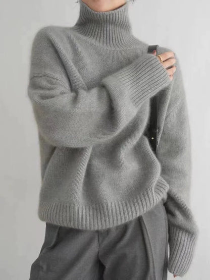 https://cdn.shopify.com/s/files/1/0957/7286/8982/files/Womens-Turtleneck-Sweater-Relaxed-Fit-Ribbed-Neck-Cuffs-3.webp?v=1770237690