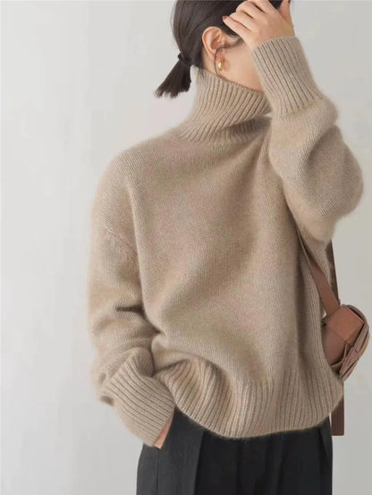 https://cdn.shopify.com/s/files/1/0957/7286/8982/files/Womens-Turtleneck-Sweater-Relaxed-Fit-Ribbed-Neck-Cuffs-6.webp?v=1770237690