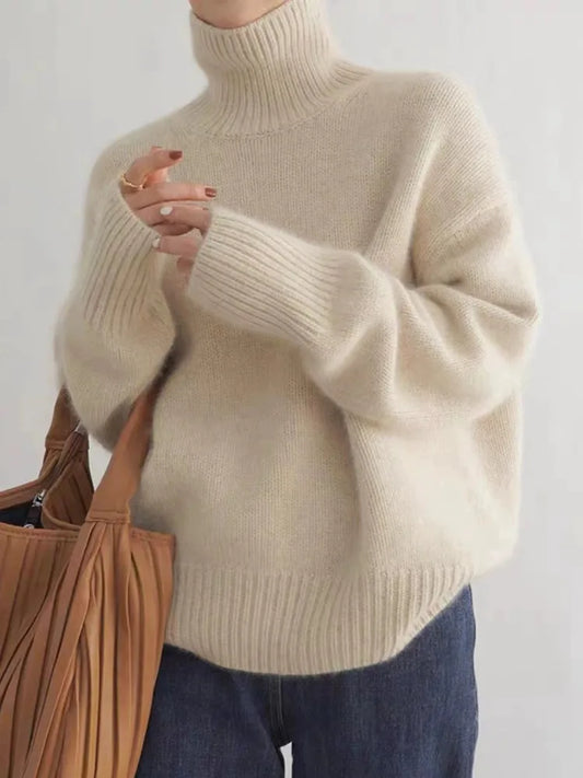 https://cdn.shopify.com/s/files/1/0957/7286/8982/files/Womens-Turtleneck-Sweater-Relaxed-Fit-Ribbed-Neck-Cuffs.webp?v=1770237691