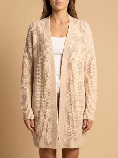 Women's longline open front cardigan in cream, front view
