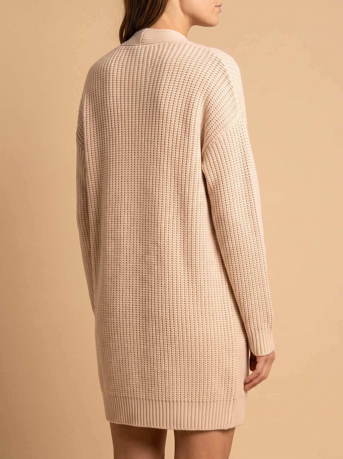Women's longline open front cardigan in cream, back view